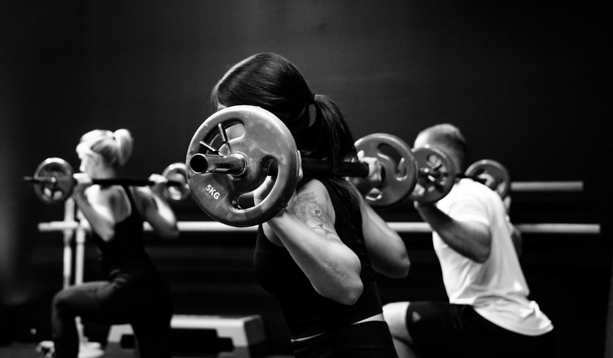 Instructor leading a rehabilitation class with focused participants